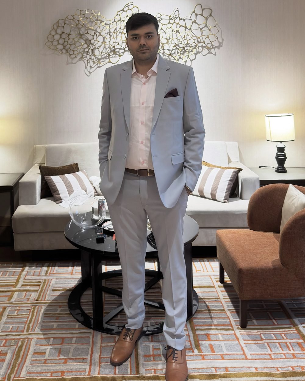 Hemant Tiwari in a grey suit